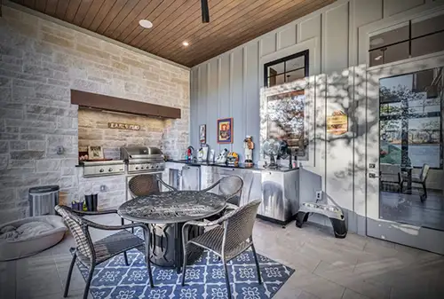Custom outdoor kitchen with natural stone